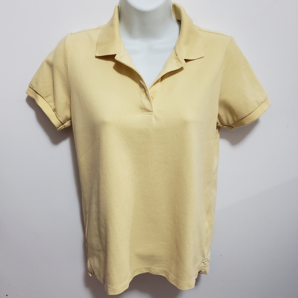 Uniqlo pale yellow polo shirt